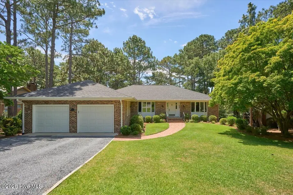 154 Pine Lake Drive, Whispering Pines, NC 28327 – photo 1 of 70: front