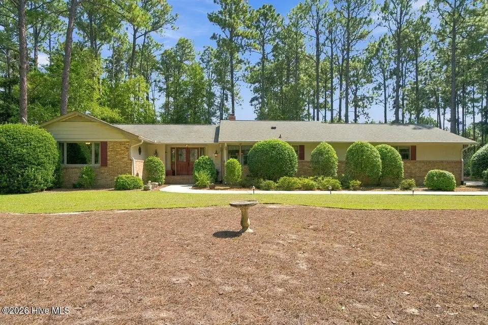 55 Birdie Drive, Whispering Pines, NC 28327 – photo 1 of 54: 55 Birdie