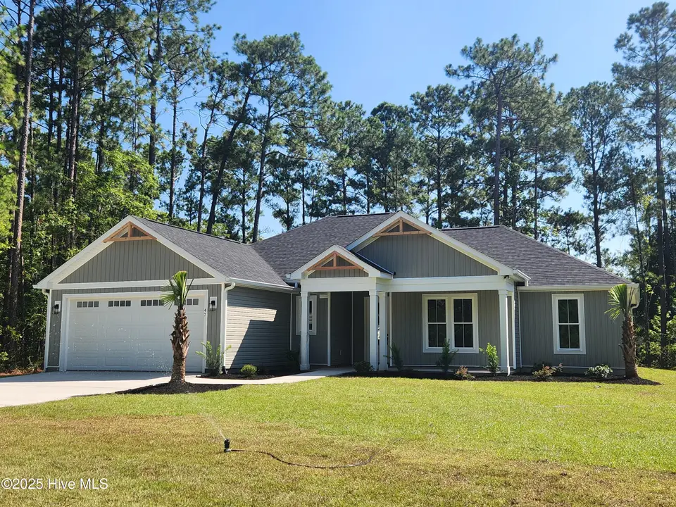 47 Pinewood Drive, Carolina Shores, NC 28467 – photo 1 of 38: 20250726_103859