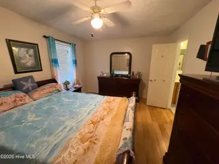 144 Waccamaw Shores Road, Lake Waccamaw, NC 28450 – photo 22: Bedroom 3