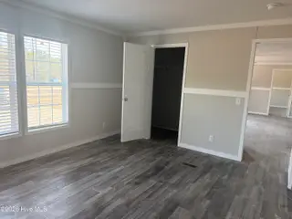 6850 Lewis Drive SE, Winnabow, NC 28479 – photo 5: Master bedroom