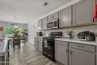 737 Landmark Cove, Carolina Shores, NC 28467 — 4-bedroom home in Landmark at Lighthouse Cove, Carolina Shores, NC, photo 15 of 39: Kitchen
