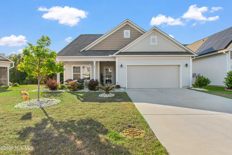 587 Meadowbrook Lane NW, Calabash, NC 28467 – photo 1 of 43: Front
