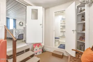 187 Mullens Drive, Harkers Island, NC 28531 – photo 20: Great Room w/ Half Bath