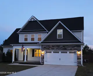 123 Sonia Drive, Hubert, NC 28539 — 3-bedroom home in Eastport, Hubert, NC, photo 6 of 75: Front R Twilight