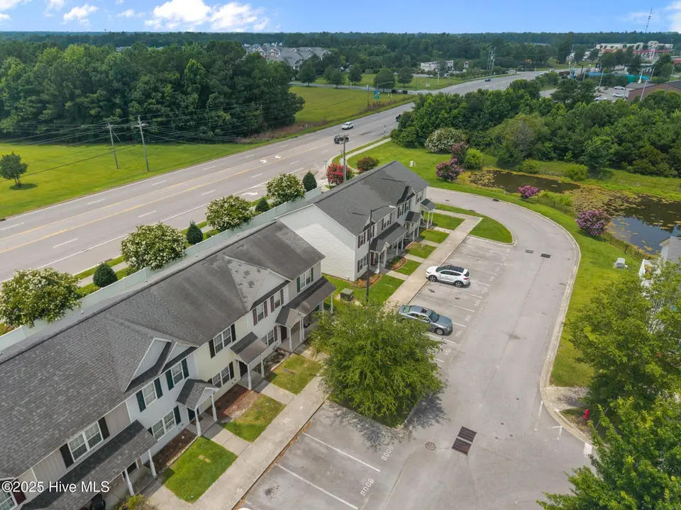 6007 Grandeur Avenue, Jacksonville, NC 28546 – photo 1 of 30: 5-web-or-mls-DJI_20250624131507_0174_D