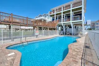 5103 W Beach Drive, Oak Island, NC 28465 – photo 1: 5103 W Beach Drive