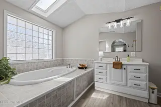 213 Pensacola Avenue, Morehead City, NC 28557 – photo 13: Master Bathroom With New LVP Flooring