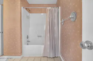 1708 W Beach Drive, Oak Island, NC 28465 – photo 22: 21-Final 1708 W Beach Dr OKI-RJREM-1865