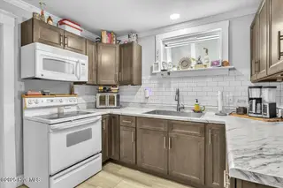 103 N 13th Street, Wilmington, NC 28401 — 6-bedroom home, Wilmington, NC, photo 3 of 60: 26-Final 103 N 13th St RJREM-1377
