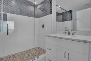 3713 Island Drive, North Topsail Beach, NC 28460 – photo 20: King bathroom on 2nd level