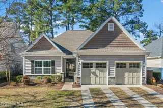 123 Bellwood Circle, Sunset Beach, NC 28468 – photo 1: Front of home