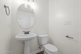 122 Tanbark Drive, Jacksonville, NC 28546 — 3-bedroom home in Aragona Village, Jacksonville, NC, photo 18 of 53: Half Bathroom