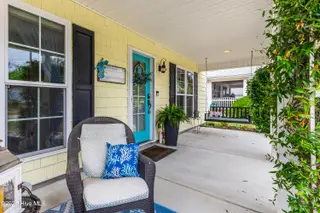 131 NE 33rd Street, Oak Island, NC 28465 – photo 12: large covered front porch