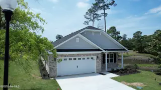 1209 Opaca Drive SE, Bolivia, NC 28422 – photo 2: Pond view