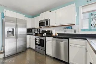819 S Topsail Drive, Surf City, NC 28445 – photo 5: 30-web-or-mls-GI - 819 Topsail Dr - List