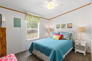 7203 Banner Street SW, Ocean Isle Beach, NC 28469 — 3-bedroom manufactured home in Seaside Heights, Ocean Isle Beach, NC, photo 19 of 38: Third Bedroom