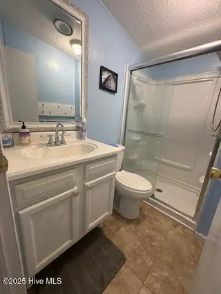 1554 Gate 2 SW, Ocean Isle Beach, NC 28469 — 3-bedroom manufactured home in Seaside North, Ocean Isle Beach, NC, photo 13 of 17: bath 2