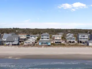 1011 W Beach Drive, Oak Island, NC 28465 – photo 4: 12-web-or-mls-DJI_20260122122351_0281_D
