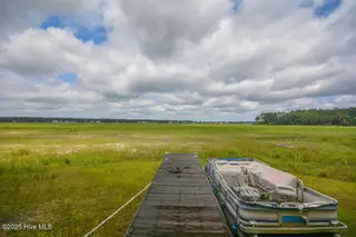 1064 Tresses Court, Vass, NC 28394 – photo 16: Dock w/Boat