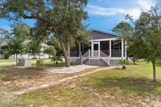 138 NE 74th Street, Oak Island, NC 28465 — 3-bedroom home, Oak Island, NC, photo 1 of 44