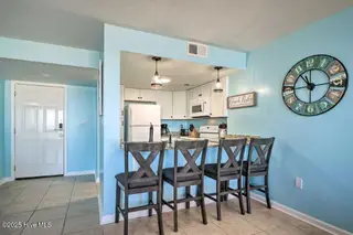 2000 New River Inlet Road Unit 3209, North Topsail Beach, NC 28460 – photo 7: bar stool sitting