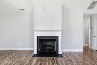 106 Heckathorne Drive, New Bern, NC 28560 — 3-bedroom home in West Crossroads, New Bern, NC, photo 4 of 33: Fireplace
