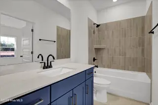 9823 Enchanted Way, Leland, NC 28451 – photo 15: Downstairs Guest bathroom