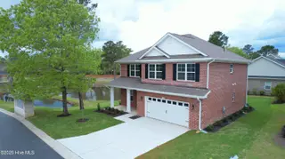 1215 Opaca Drive SE, Bolivia, NC 28422 – photo 2: Side view