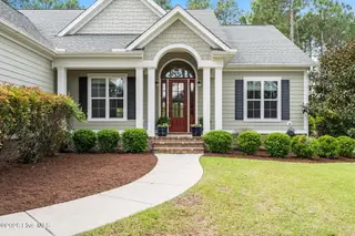 3815 Ridge Crest Drive, Southport, NC 28461 – photo 10: Covered Front Porch