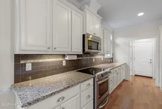 402 Cornubia Drive, Castle Hayne, NC 28429 – photo 20: Cornubia402-6kitShaneL33A4772-CR2