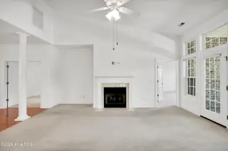 1009 N Sanderling Drive, Leland, NC 28451 — 3-bedroom townhome in Waterford of the Carolinas, Leland, NC, photo 6 of 63: Living Room