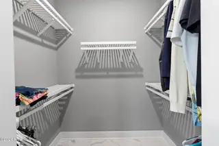 135 NW 7th Street, Oak Island, NC 28465 – photo 17: Owners Closet