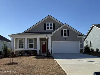 1214 Woodhouse Drive NW, Ash, NC 28420 – photo 1: Lot 23 – 1214 Woodhouse Drive NW