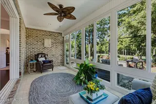 8309 Oak Abbey Trail NE, Leland, NC 28451 — 3-bedroom home in Compass Pointe, Leland, NC, photo 23 of 66: Sunroom