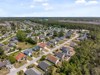5014 N Hampton Drive SE, Southport, NC 28461 – photo 8: 8-web-or-mls-DJI_20260415124200_0400_D