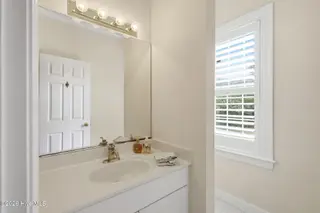 104 Talford Drive, Atlantic Beach, NC 28512 – photo 19: Main level half bathroom