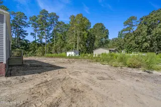 580 S Windward Drive SW, Supply, NC 28462 – photo 24: Side Yard looking towards the Rear