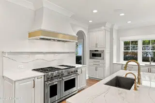 1621 S Moorings Drive, Wilmington, NC 28405 — 5-bedroom home in Landfall, Wilmington, NC, photo 13 of 76: 029_1621_south_moorings_drive_daytime_ma