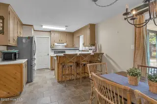 209 NE 56th Street, Oak Island, NC 28465 – photo 15: 25-Final 209 NE 56th St OKI-RJREM-9441