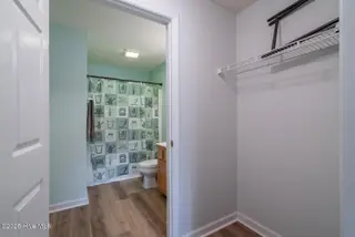 3350 Club Villas Drive 104, Southport, NC 28461 — 2-bedroom condo in St James, Southport, NC, photo 22 of 34: Open Closet