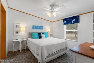 7203 Banner Street SW, Ocean Isle Beach, NC 28469 — 3-bedroom manufactured home in Seaside Heights, Ocean Isle Beach, NC, photo 13 of 38: Master Bedroom