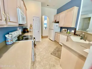 7599 Dunbar Drive SW, Sunset Beach, NC 28468 – photo 11: Kitchen