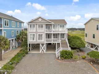 758 Ocean Boulevard W, Holden Beach, NC 28462 – photo 2: 82-web-or-mls-DJI_20250814140816_0809_D