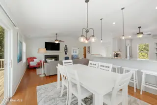 106 Wyndward Court, Emerald Isle, NC 28594 – photo 15: Dining area with deck access