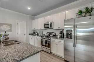 464 Goldenrod Terrace Lot 61, Calabash, NC 28467 – photo 12: Kitchen-2---Gwinnett