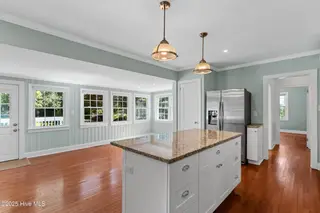 102 N 25th Street, Wilmington, NC 28405 — 2-bedroom home, Wilmington, NC, photo 5 of 35: Open Kitchen - Sunroom