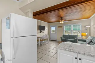 103 24th Street, Emerald Isle, NC 28594 — 4-bedroom townhome in Emerald Isle By The Sea, Emerald Isle, NC, photo 8 of 51: Kitchen & Living Area