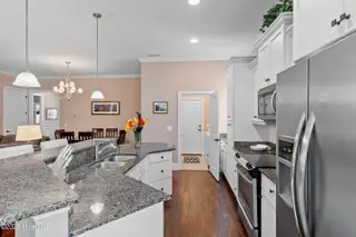 4239 Ashfield Place, Southport, NC 28461 – photo 8: Hardwood Floors | Awesome Appliances