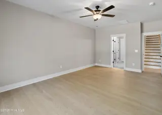 161 Twining Rose Lane, Holly Ridge, NC 28445 – photo 14: main floor primary suite